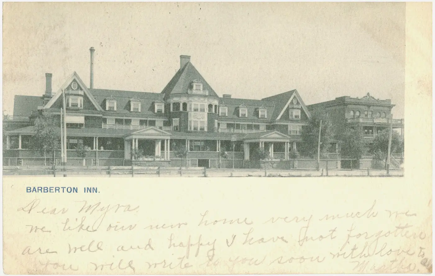 Postcard photograph of the Barberton Inn, a large frame hotel building, posted in 1906